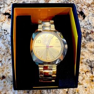 New Macy’s Summit 2013 XNY gold analogue stainless steel watch round face.